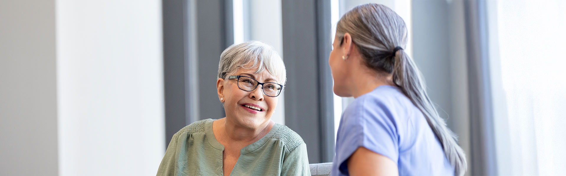 Image of doctor talking to patient