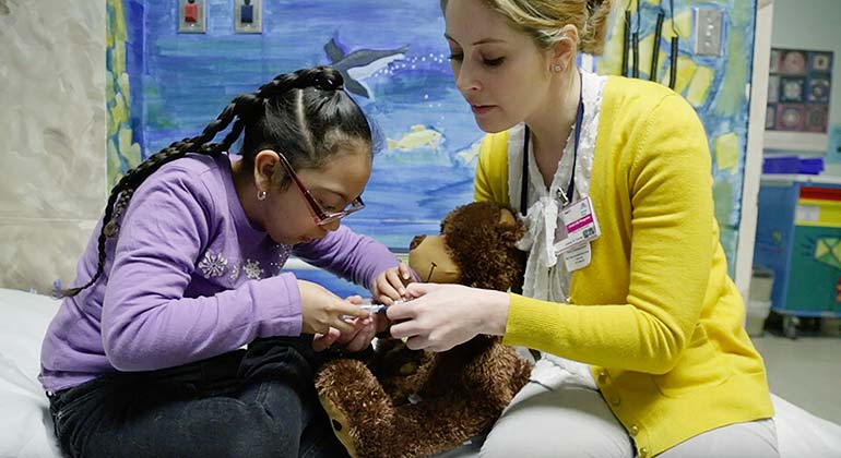 Patient with staff member in emergency department