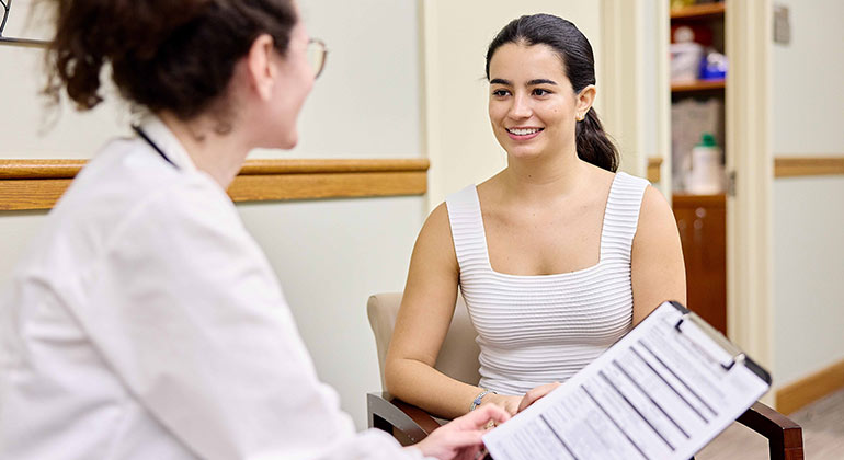 doctor talking to patient