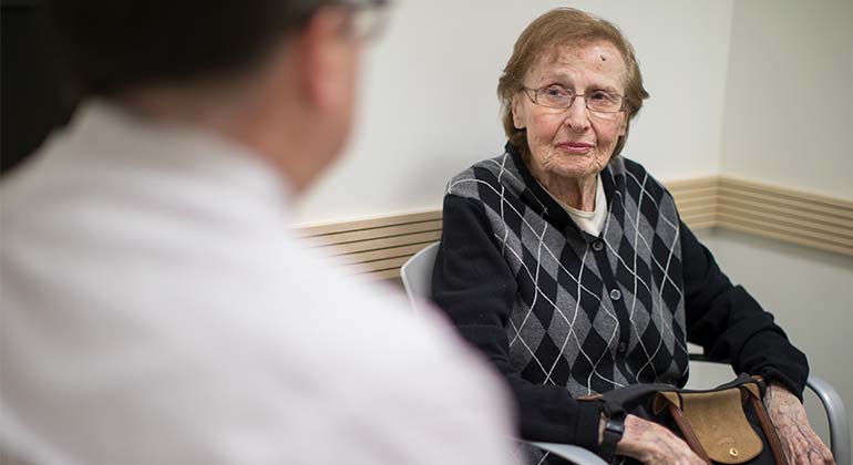 Doctor with geriatric patient