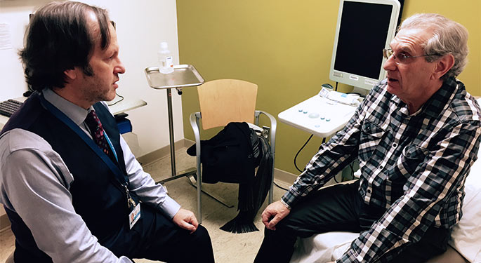 Doctor with male patient