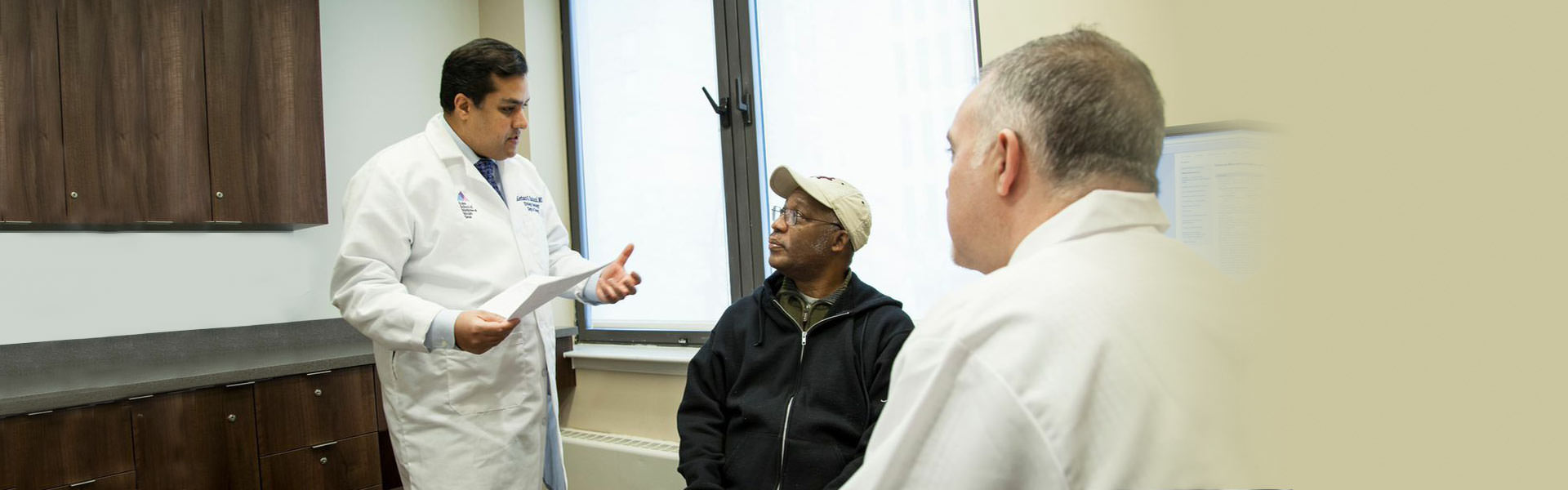 Dr. Badani with patient at doctor’s office