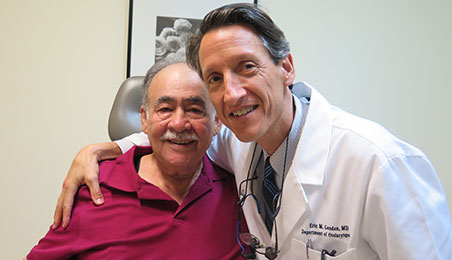 Dr. Carlos Rios and patient