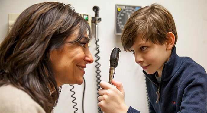 Young boy and female doctor