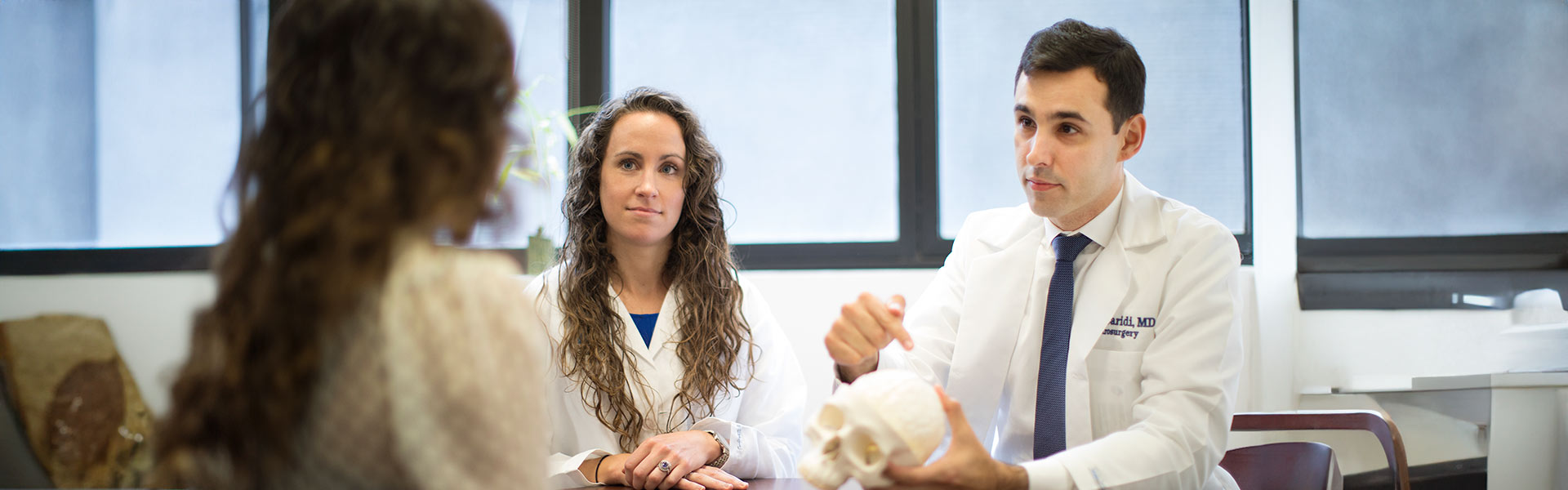 Image of doctors with patient