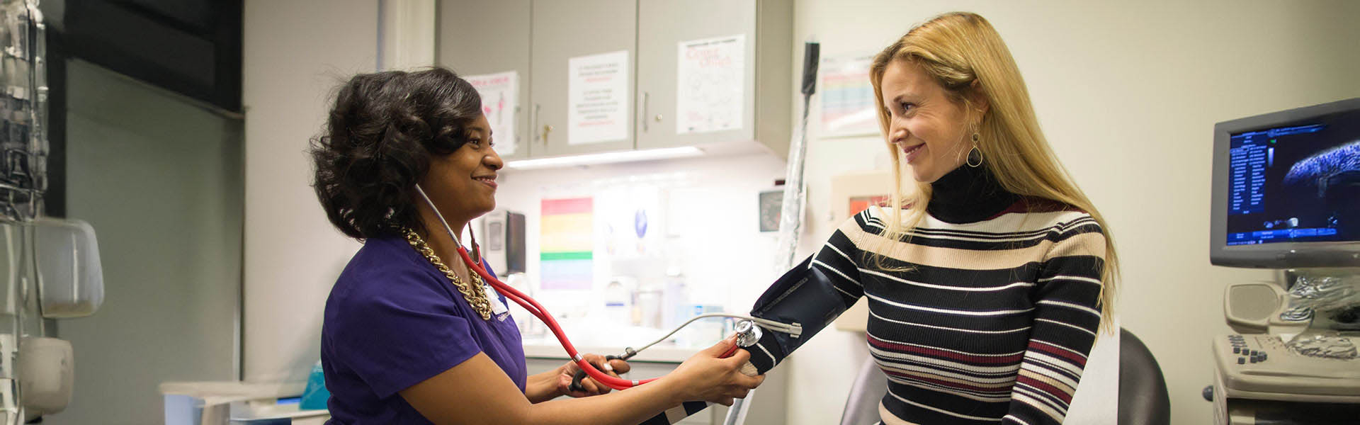 doctor checking patient