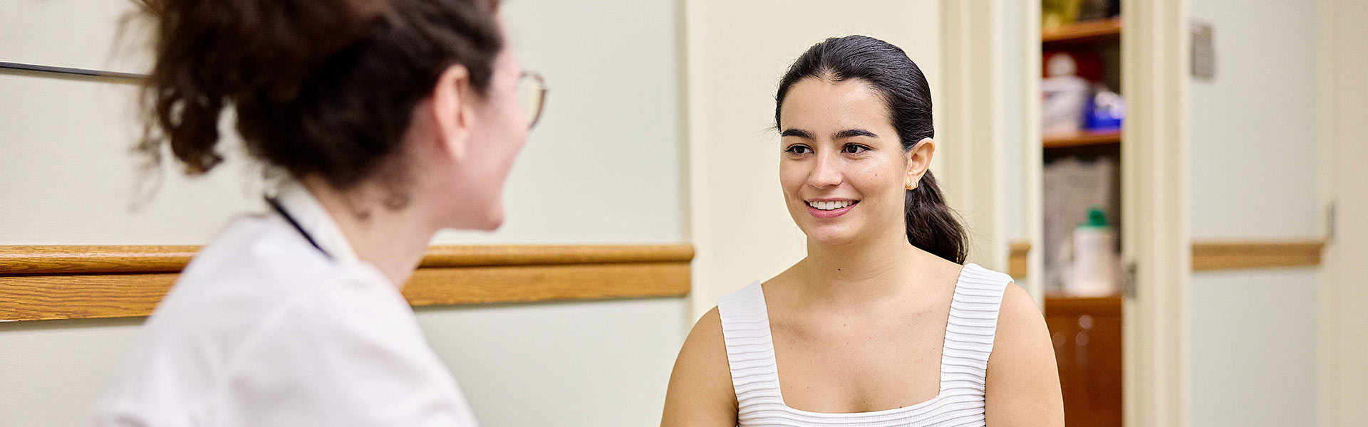 doctor talking to patient