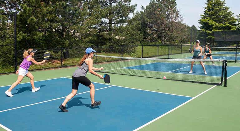 Image of women playing sports