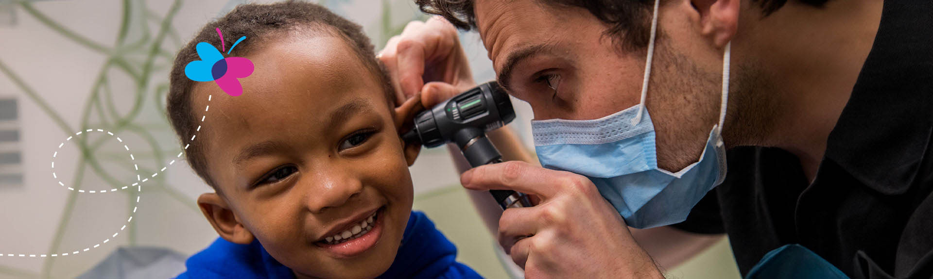 doctor examining pediatric patient