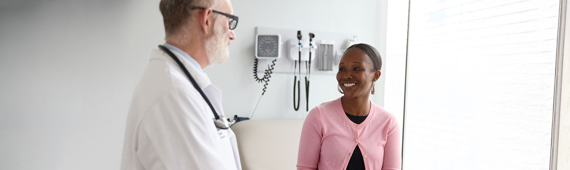 Image of doctor talking to patient